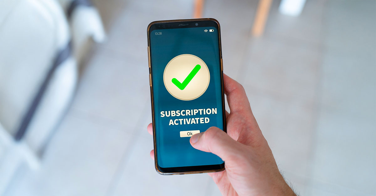 Subscription activated notification on smart phone. Subscription in e-commerce - illustrative image